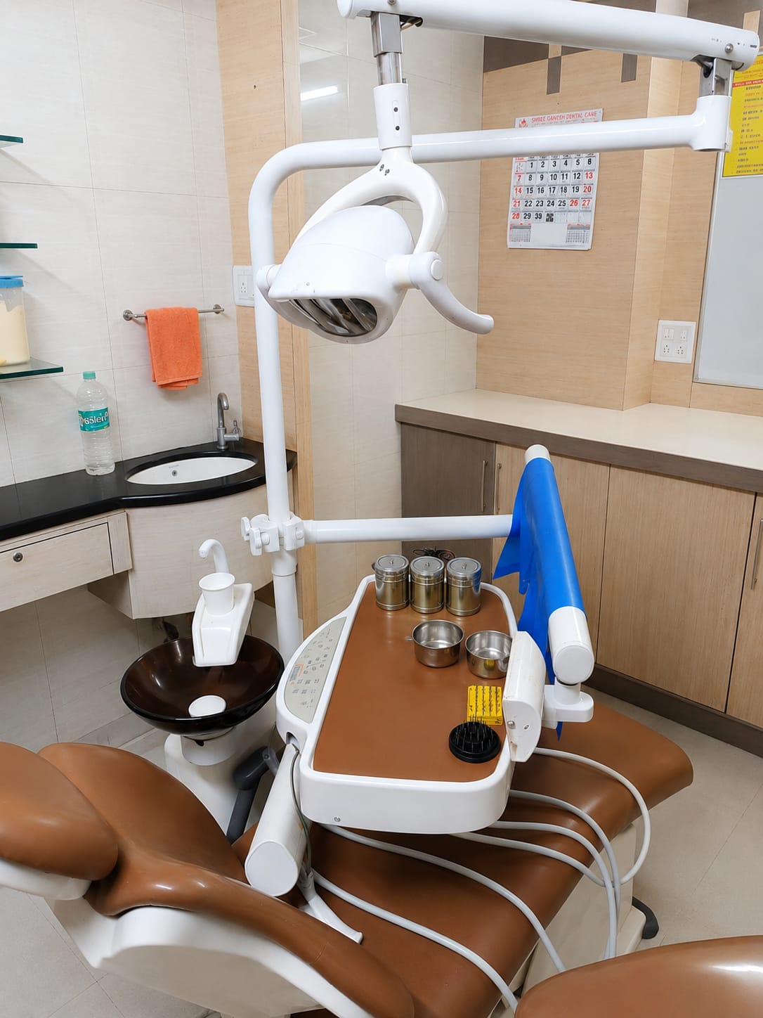 Dental clinic room with chair and equipment